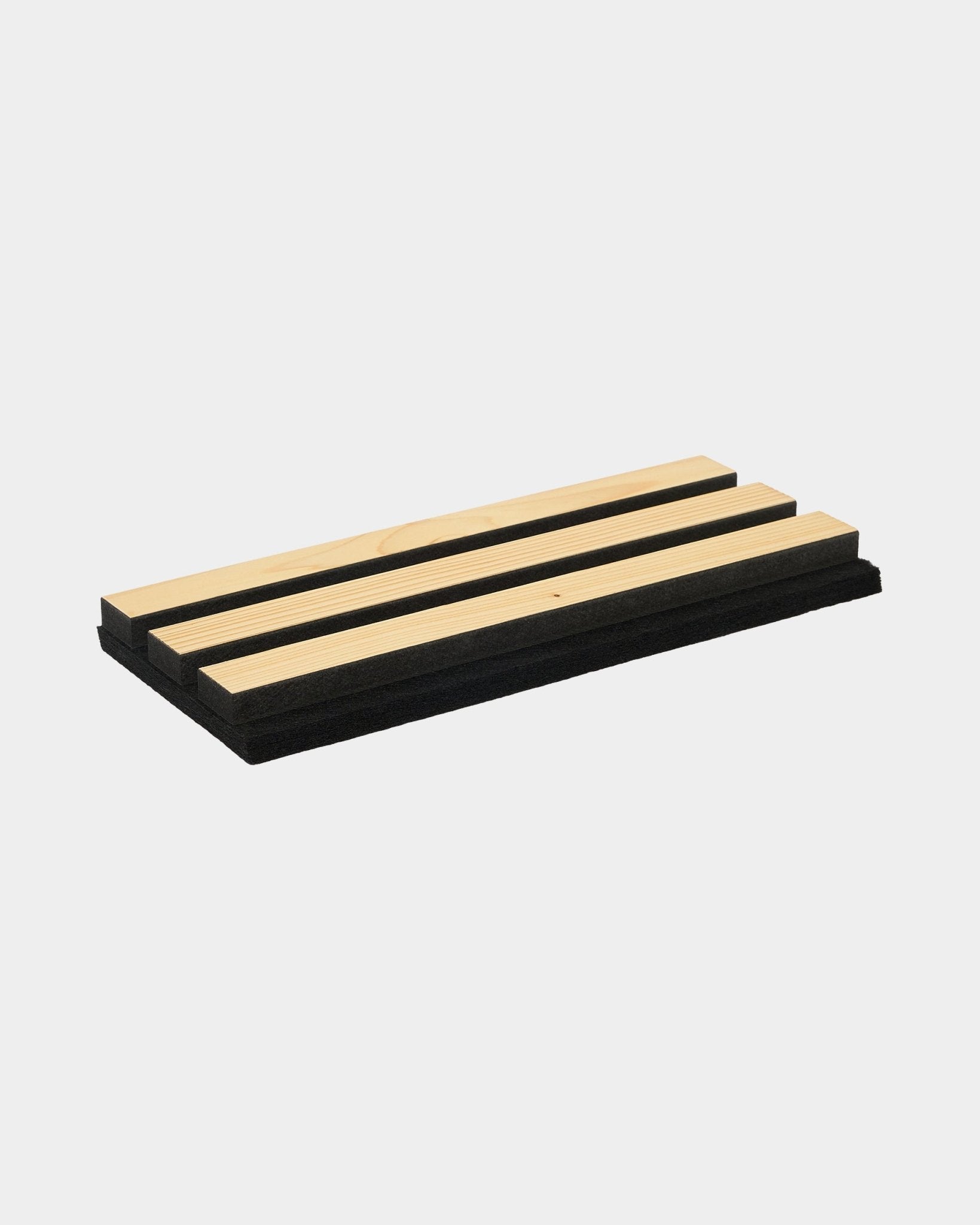 WoodUpp Akupanel sample: rectangular acoustic panel with three light oak slats on a black felt base, shown against a white background.